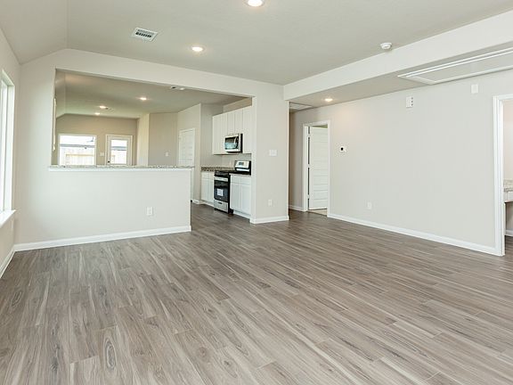 Family Room to Kitchen and Dining Area