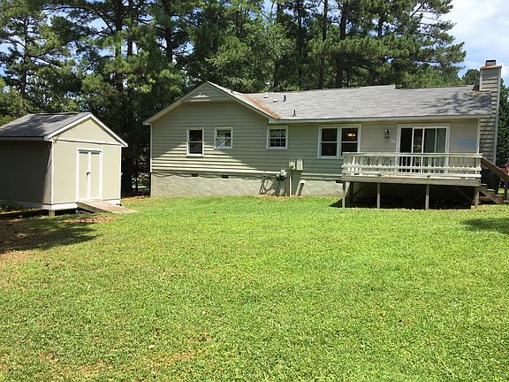 Back yard, Deck, and Storage Building
