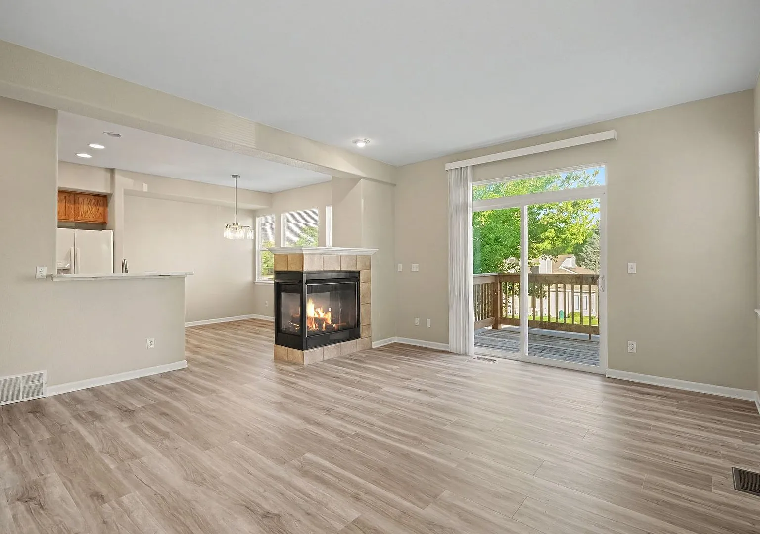 Beautifully Updated 3-Bedroom Townhome with Finished Basement, 2-Car Garage & Views — Photo 3