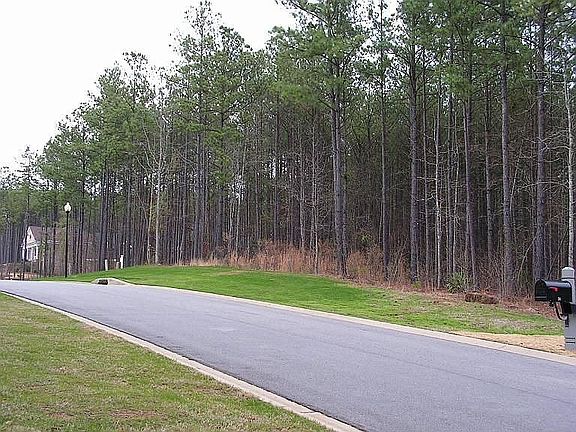 Double Lots E8 & E9, House #26 & 28