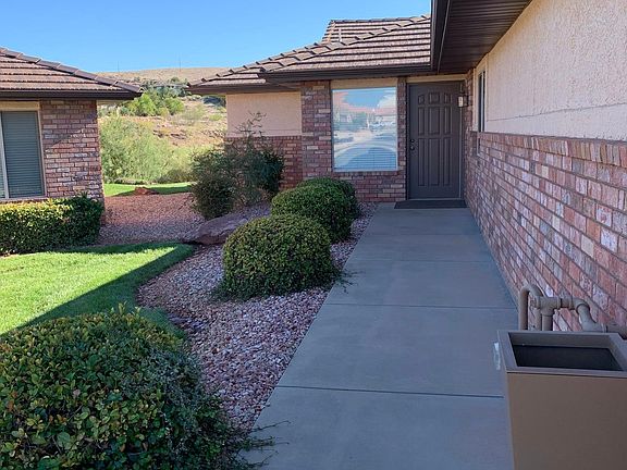 Front walkway. HOA maintains landscape.