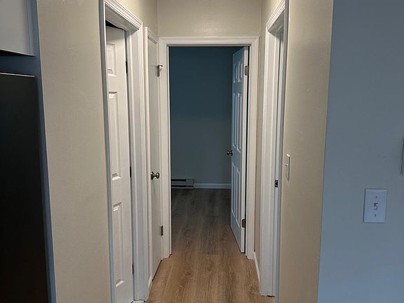 Bathroom on left Hallway Closet on left Bedroom B straight ahead Bedroom A on right