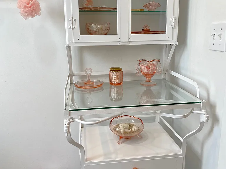 Hall Bath Exquisite Antique Medical Cabinet w/4 pink DG casters & decor