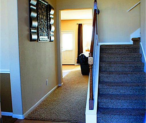 Entry way opens up to dining room on left