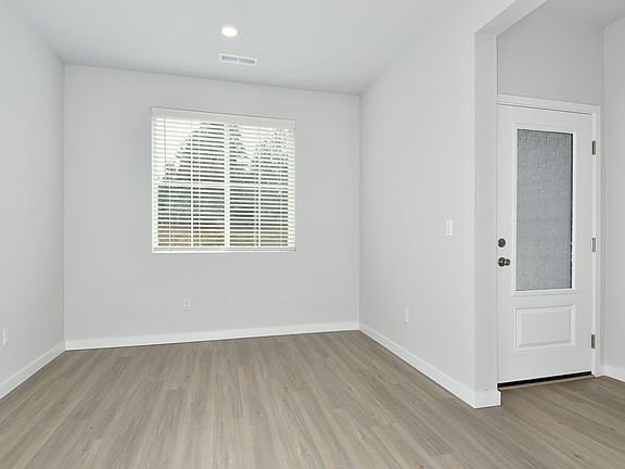 There is a formal dining room off of the foyer.