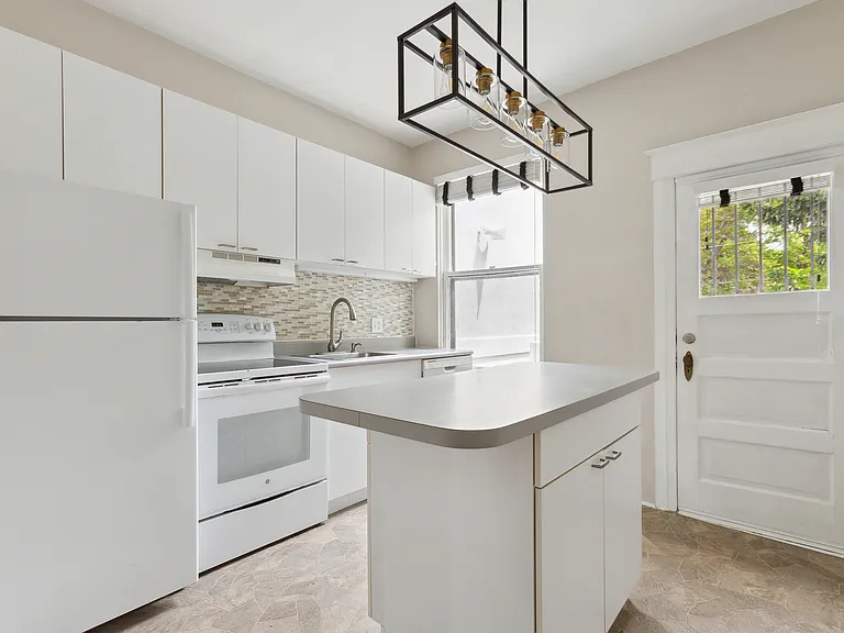 Kitchen exits onto private balcony
