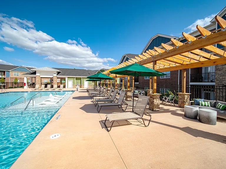 Soak up the sunshine by the sparkling pool.