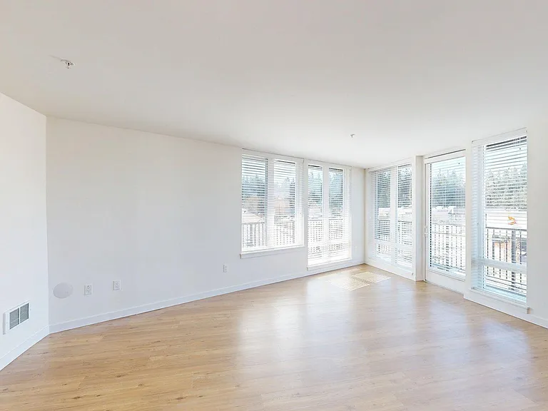 Apartment Living Room with Wood-Style Flooring and Patio/Balcony.