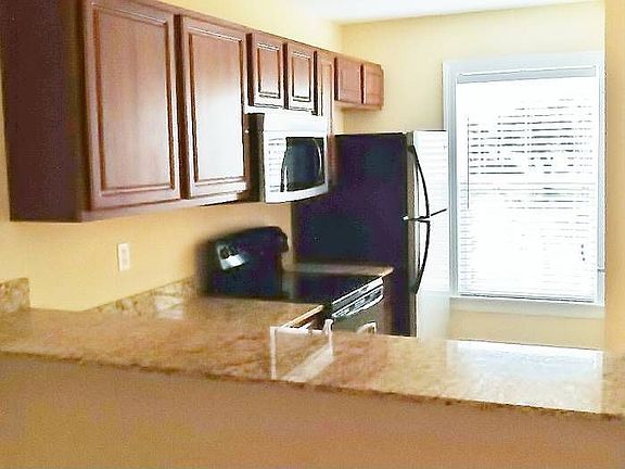 Kitchen w/granite tops