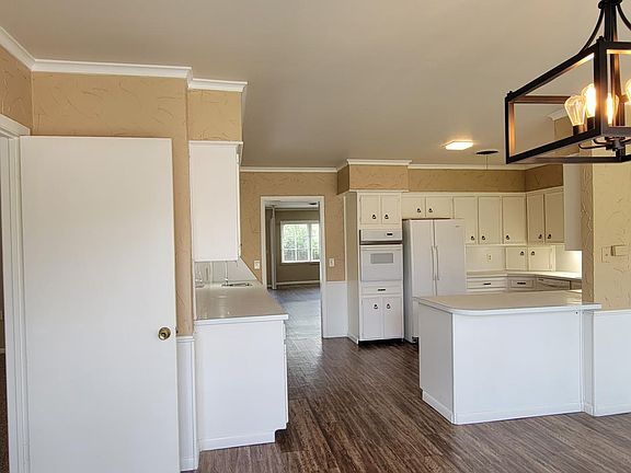 Dining & kitchen from back door area