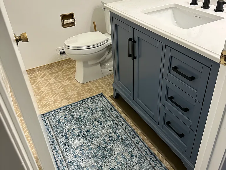 Bathroom remodeled, mirror being installed. New vanity, paint and professionally cleaned