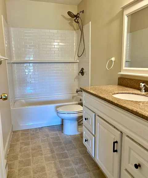 FULL BATH IN HALL- ANGLE 1- SHOWS NEW TUB SHOWER INSERT- JUST INSTALLED! 7/2026