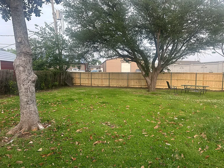 Backyard showing privacy fence across the back