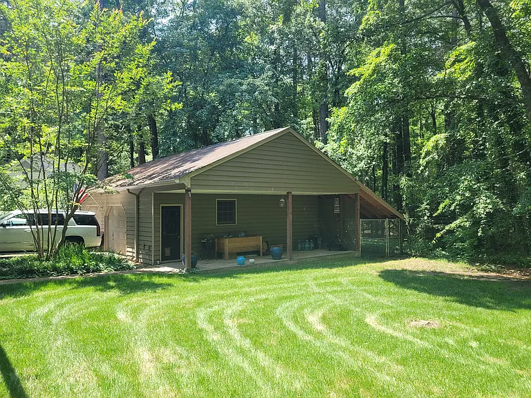 Detached garage with fenced dog run