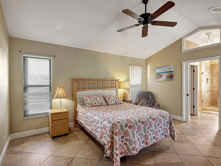 master bedroom, door to the master bathroom and closets