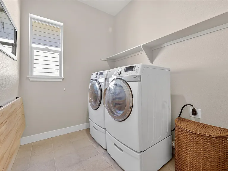 Laundry room with fold of table for folding