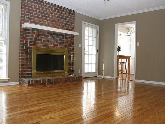 Family Room w/Refinished Hardwoods, Brick Gas Fireplace & Door To Back Yard