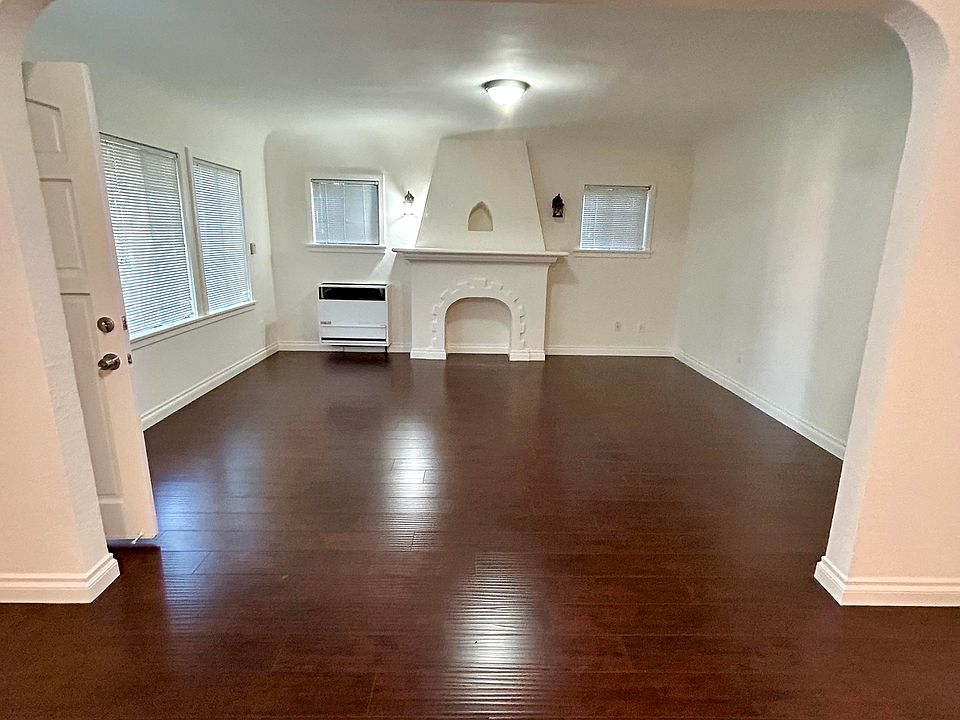 Open floorplan from kitchen, through dinning room, & living room