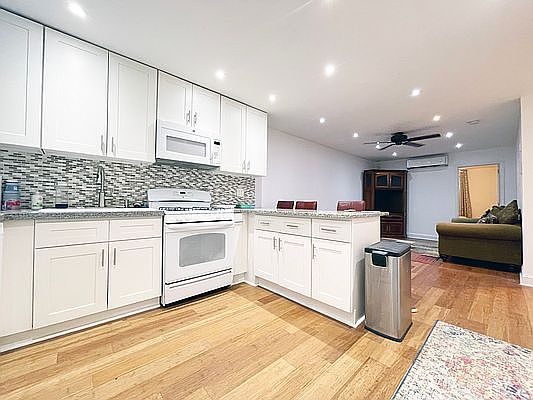 2nd image of 410 E 119th St APT 1