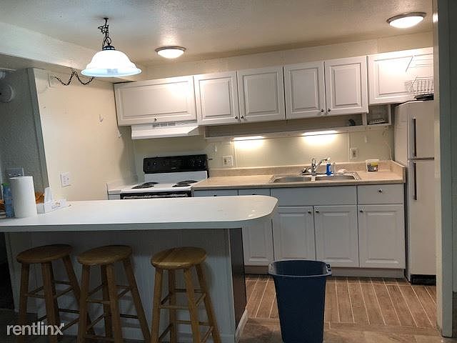 New Stove, Kitchen area with Bar Cabinet