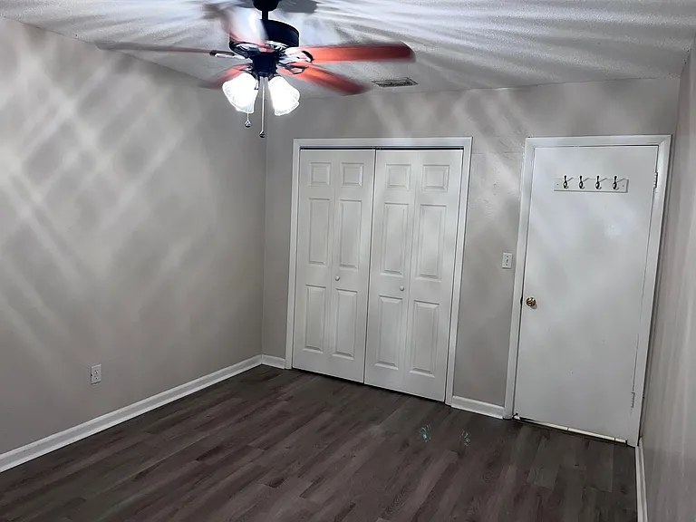 Large room at the end of the hallway. (View 2)