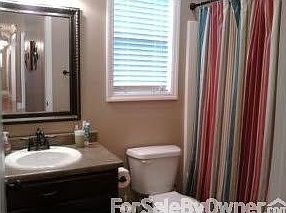 Bathroom 2
						:
						This bathroom is shared by two bedrooms and is located near the living room.