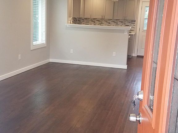 Charming totally remodel home with farmhouse sink in kitchen, hardwood floors, and lots of windows that let in natural light. Must see....