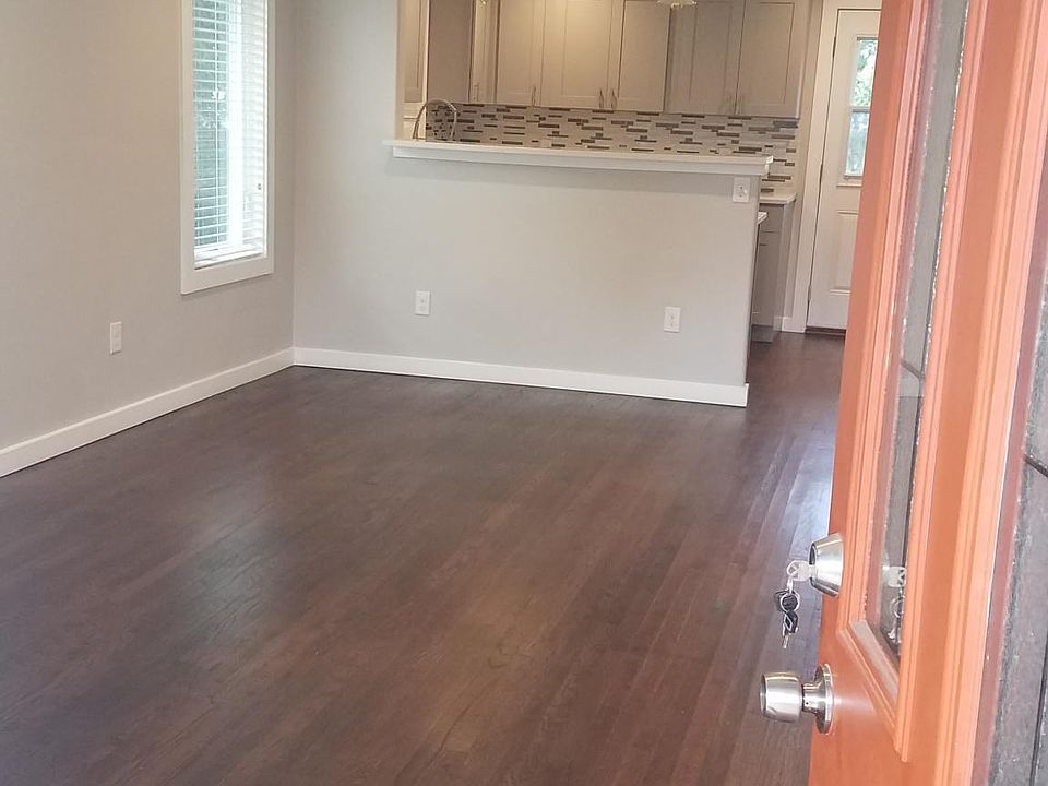 Charming totally remodel home with farmhouse sink in kitchen, hardwood floors, and lots of windows that let in natural light. Must see....