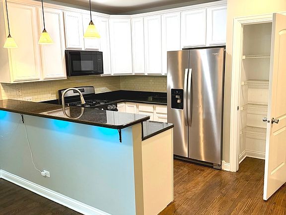 2nd image of 5017 S Prairie Ave #1N