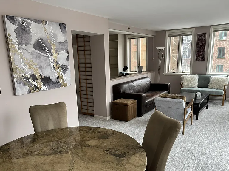 Open-concept dining and living space perfect for comfortable living and entertaining.