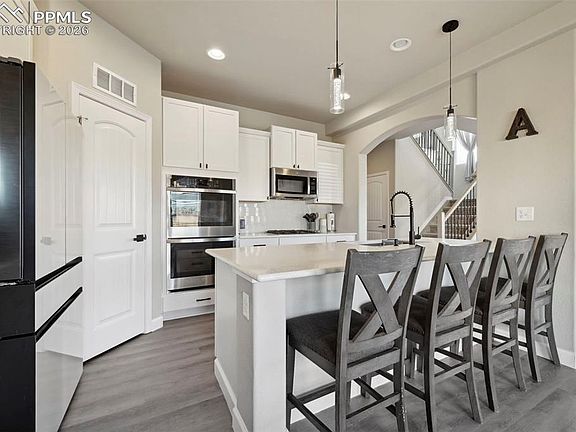 5th image of 8295 Thedford Ct