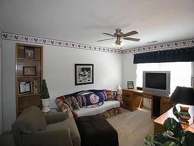 BR 2 w/ceiling fan & neutral carpet