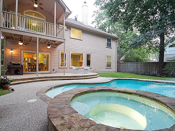 Sparkling lagoon-style pool for those hot summer days and spa for relaxing after work.