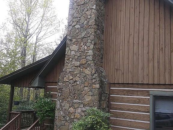 Stacked stone chimney.