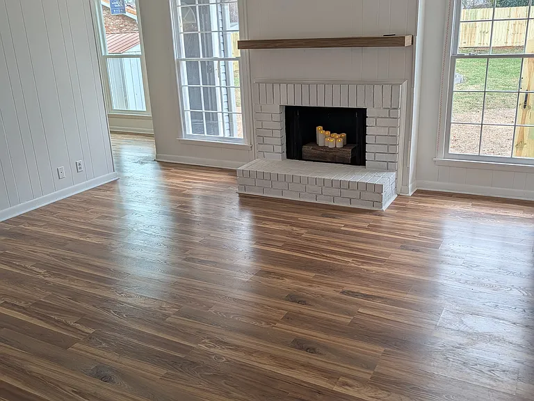Large living room with non-wood burning fire place