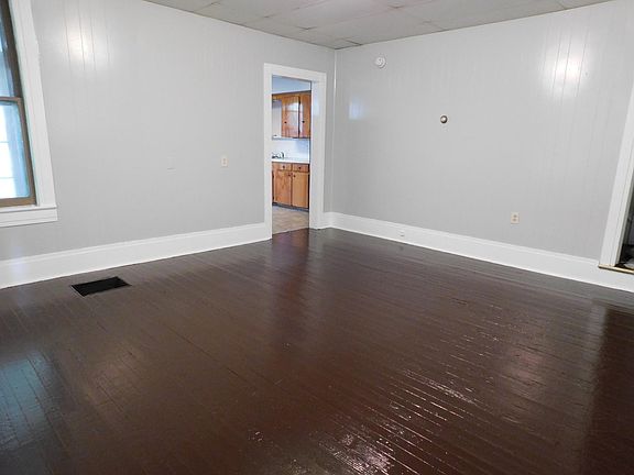 Dining area from front door looking into kitchen