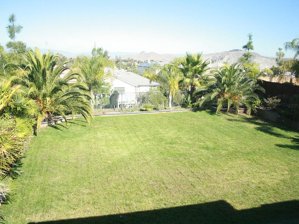 View from Master Bedroom and other upstairs bedroom, shows backyard size too...(old photo)