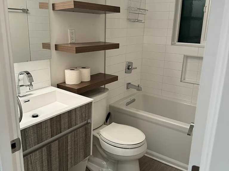 Full Size Bathroom with Built-In Shelves