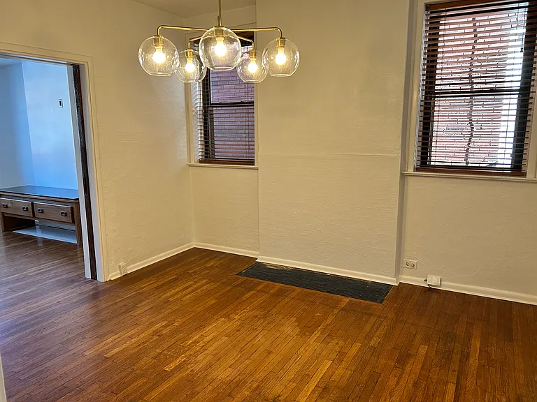 Dining room looking back into living room. Pocket door separates those spaces.