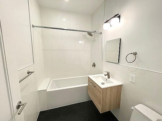 5th image of 329 E 12th St APT 22