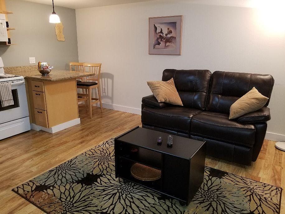 Living area has Leather Power Recliner