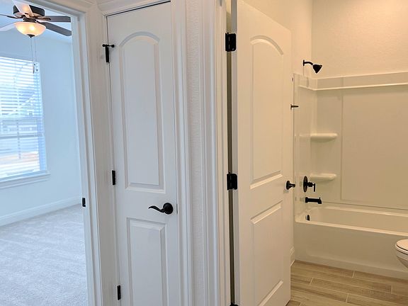 Hallway to the guest bath and bedroom