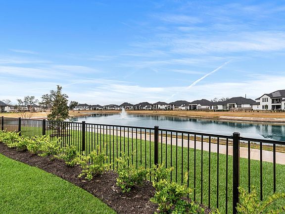 Lake lot with a walking trail