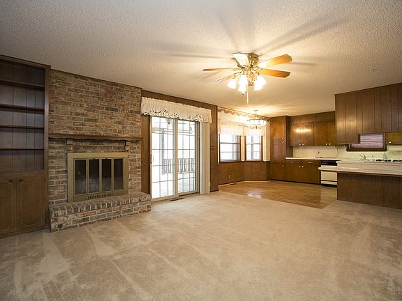 Huge open den with fireplace