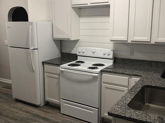 Brand new White Cabinets with Granite counter tops and new a