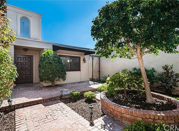 Front Courtyard Entry with Brickwork