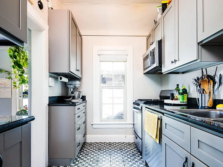 Remodeled kitchen with generous storage and counter space