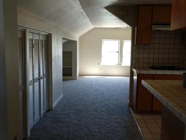 Kitchen, pantry on the left side, kitchen to the right.