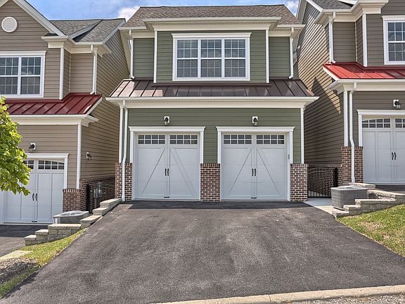 Attached 2-car Garage with Rear Access assures beautiful streetscapes