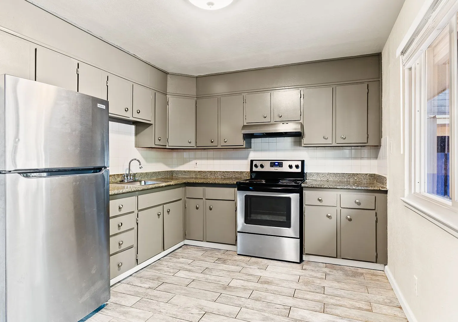 Freshly Renovated 2-Bedroom Oakland Apartment | In-Unit Laundry & Parking Included — Photo 4